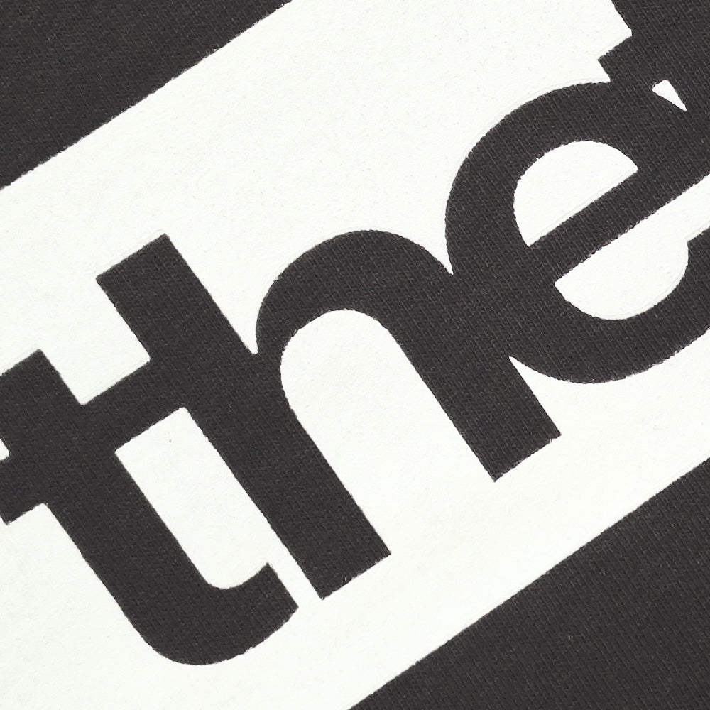 Brick logo tee - coal - front detail view